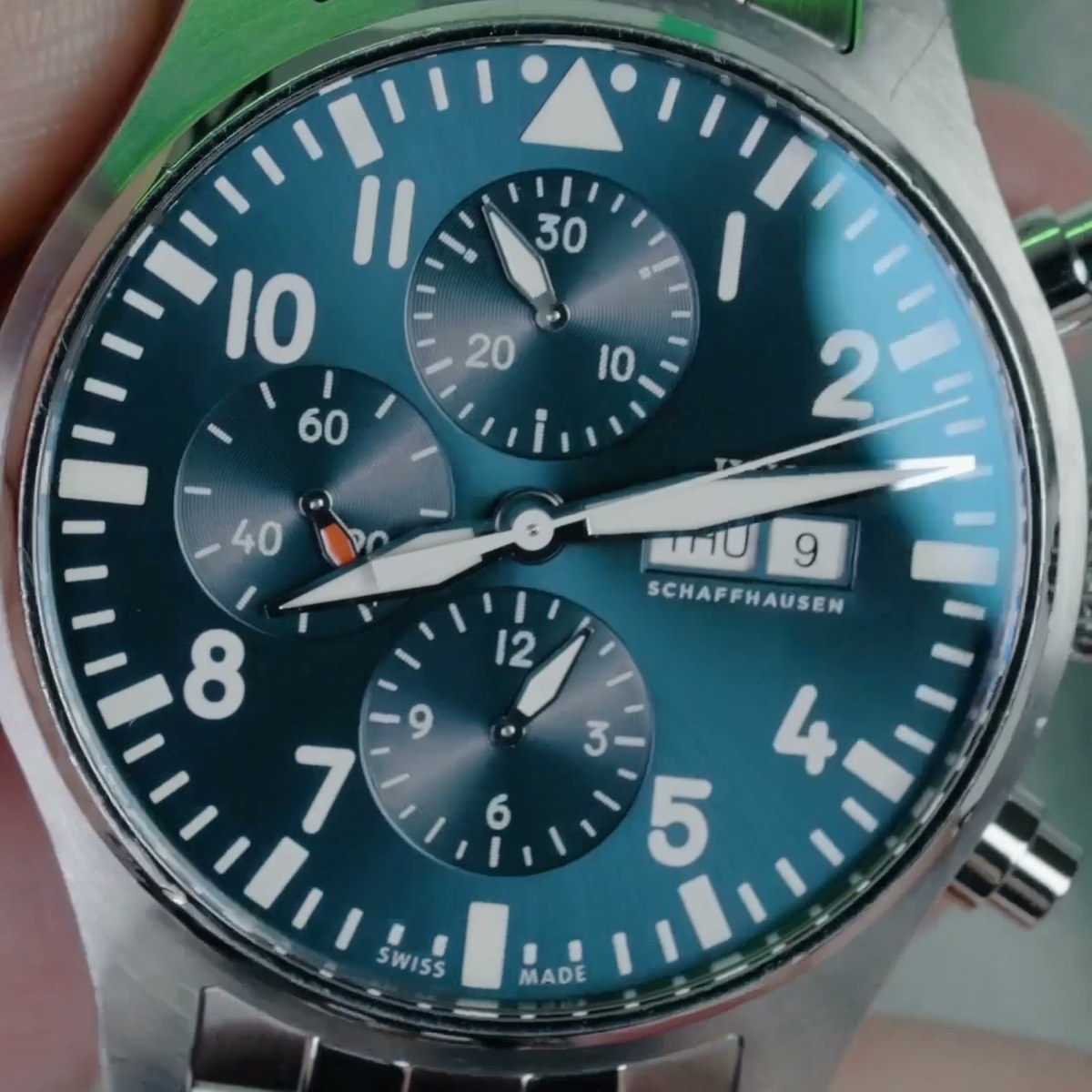 Result: clean IWC chronograph after Sparklean, no streaks or residue (still from the same footage)