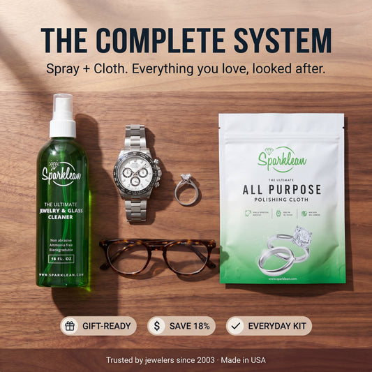 The complete Sparklean cleaning system — spray, cloth and accessories laid out together
